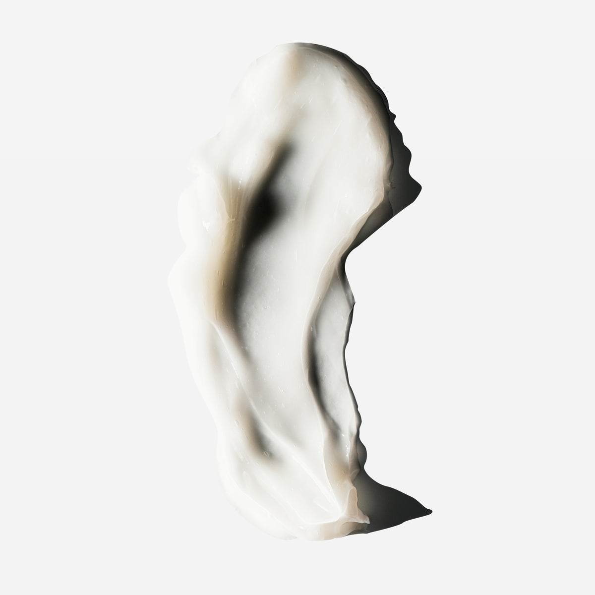 Creamy swatch of Decibelhair thickening conditioner swirled on a white background.