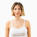 After photo showing woman with fuller, voluminous hair results from using Decibel thickening hair care products.